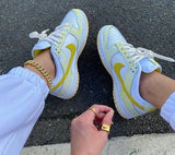 DUNK LOW YELLOW STRIKE